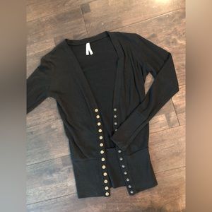 Solid Color Sweater Cardigan
 gold snap buttons, v-neck, and ribbed detail.